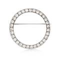 A 14 Karat White Gold and Diamond Circle Brooch