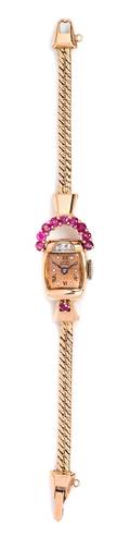 A Retro 14 Karat Rose Gold Ruby and Diamond Wristwatch Lucien Picard Circa 1940