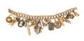 A 14 Karat Yellow Gold Charm Bracelet with 20 Attached Charms