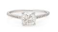 A 14 Karat White Gold and Diamond Ring