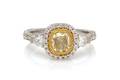 An 18 Karat Bicolor Gold Colored Diamond and Diamond Ring