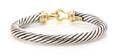 A Sterling Silver and 14 Karat Yellow Gold Cable Buckle Bracelet David Yurman
