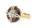 A 14 Karat Yellow Gold Tigers Eye and Diamond Ring