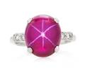 A Platinum Synthetic Star Ruby and Diamond Ring