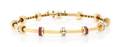 An 18 Karat Yellow Gold Diamond and Ruby Bracelet Charles Krypell