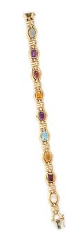 A 14 Karat Yellow Gold and Multigem Bracelet