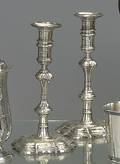 Pair of Irish Queen Anne silver candlesticks ca 1740