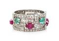 An Art Deco Platinum Diamond Ruby and Emerald Ring