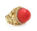 An 18 Karat Yellow Gold and Coral Ring