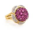 An 18 Karat Yellow Gold Ruby and Diamond Bombe Ring