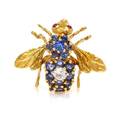 An 18 Karat Yellow Gold Sapphire Diamond and Ruby Bee Brooch