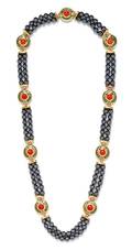 An 18 Karat Yellow Gold Hematite Coral and Enamel Necklace de Vroomen Circa 1991