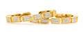A Pair of 18 Karat Yellow Gold and Diamond Cuff Bracelets