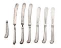 Seven English Silver Pistol Handled Butter Knives