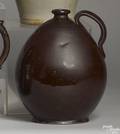 Redware jug 19th c