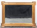 A Neoclassical Style Giltwood Mirror