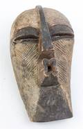 Two Ugandan Wood Busts or Masks