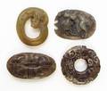 A Group of Four Carved Jade Articles