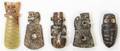 A Group of Five Carved Hardstone Toggles