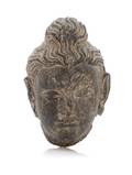 A Small Gandharan Grey Schist Head of Buddha