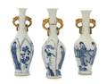 Three ParcelGilt Blue and White Porcelain Vases