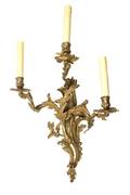 A Pair of Louis XV Style Gilt Bronze ThreeLight Sconces