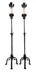 A Pair of Wrought Iron ThreeLight Torcheres