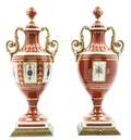 A Pair of Continental Porcelain Urns