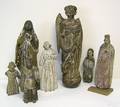 Seven early carved religious figures