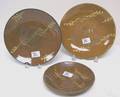 Three redware pie plates