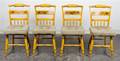 A Set of Four Hitchcock Chairs