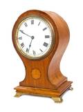 An English Inlaid Satinwood Balloon Clock