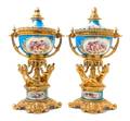 A Pair of Sevres Gilt Bronze Mounted Porcelain Covered Compotes