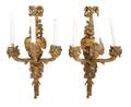 A Pair of Continental Gilt Bronze ThreeLight Sconces