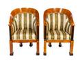 A Pair of Biedermeier Parcel Ebonized Birch Club Chairs