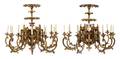 A Pair of Gothic Revival Giltwood TwelveLight Chandeliers