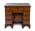 A George II Walnut Kneehole Desk
