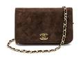A Chanel Brown Suede Quilted Clutch