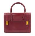 An Hermes Oxblood Leather Handbag