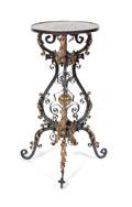A Victorian Style Gilt and Ebonized Pedestal Table