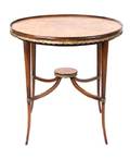 A Continental Walnut and Parcel Gilt Occasional Table