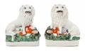 Two Staffordshire Lion Figures