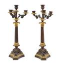 A Pair of Empire Style Gilt and Patinated Metal FourLight Candelabra