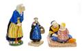 A Collection of Quimper Pottery Figures