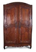 A French Provincial Relief Carved Walnut Armoire