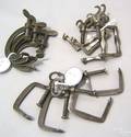Three sets of four Pennsylvania wrought iron quilting frame clamps