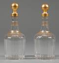 Pair of Colorless and Parcel Gilt Glass Decanters