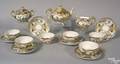 Satsuma tea service decorated with interior scene with gilt highlights comprising a teapot