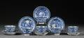 Six Blue and White Cups and Saucers