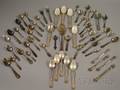 Large Group of Silver and Silver Plated Spoons